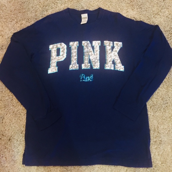 Pink long sleeve tee.